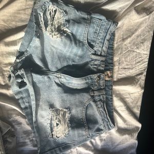 small ripped rip curl jeans light blue